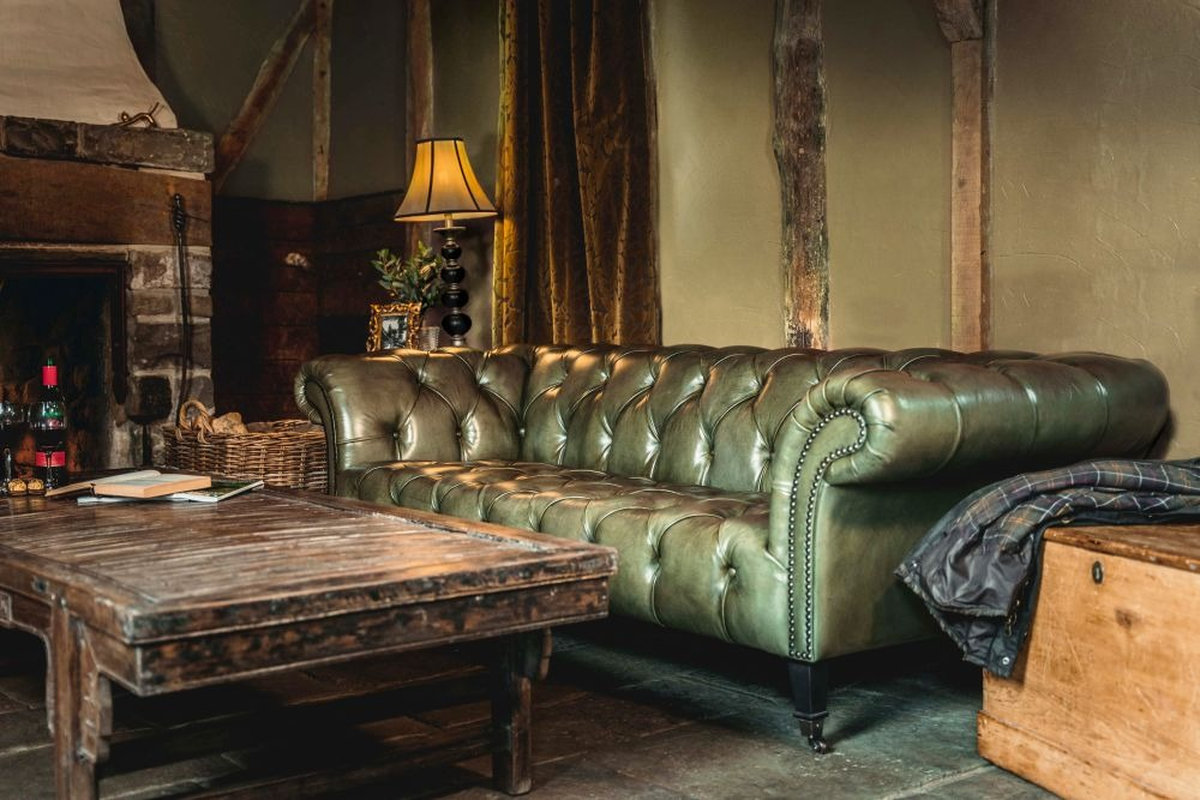 Mẫu bọc ghế sofa tại Quận 3 da màu xanh rêu cổ điển
