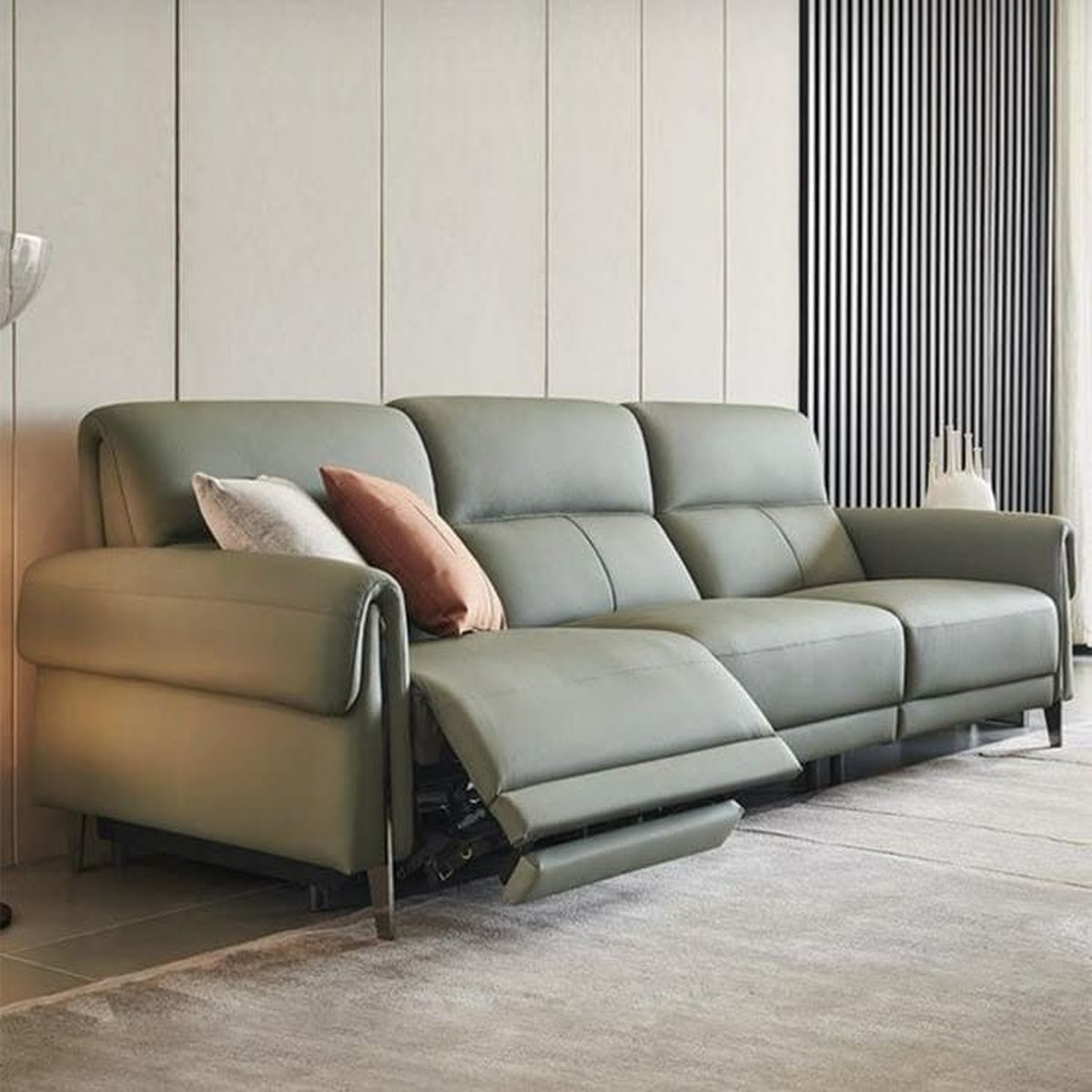Sofa da màu xanh bơ sau khi được bọc ghế sofa tại Quận 1